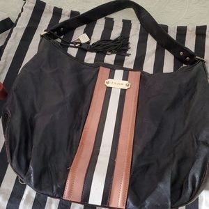 L. A. M. B. handbag leather